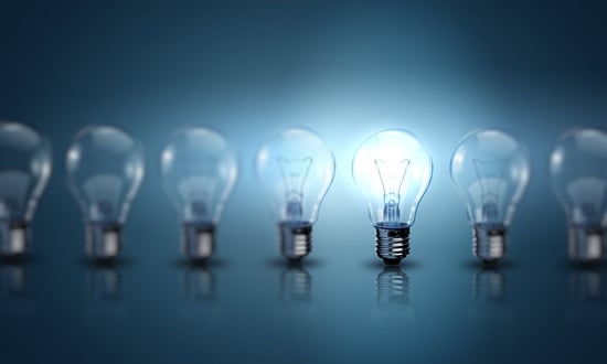 Light bulb lamps on a colour background