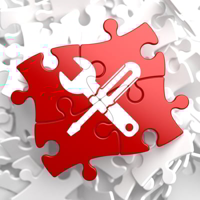Service Concept - Icon of Crossed Screwdriver and Wrench - Located on Red Puzzle. Business  Background.
