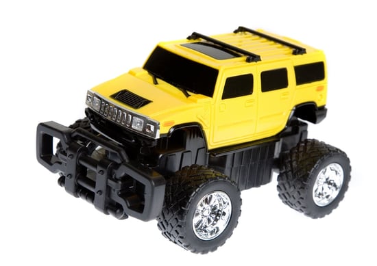 four by four remote control car over a white background